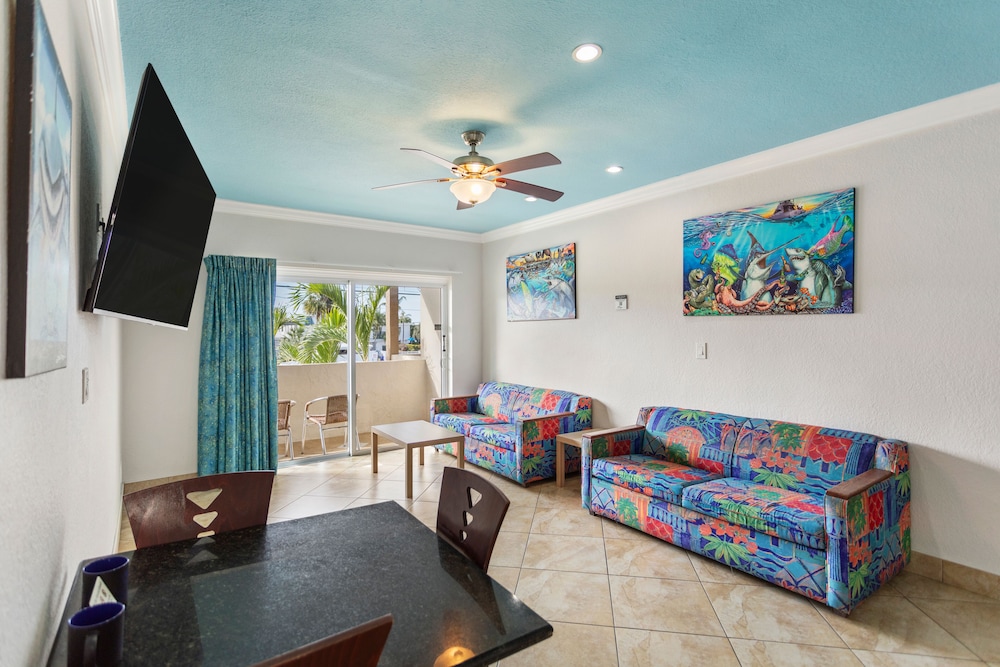 Deluxe One Bedroom Suite: 1 Queen Bed and 2 Sleeper Sofas