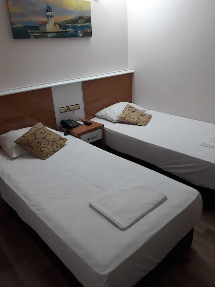 Family Quadruple Room, Multiple Beds, City View photo 2