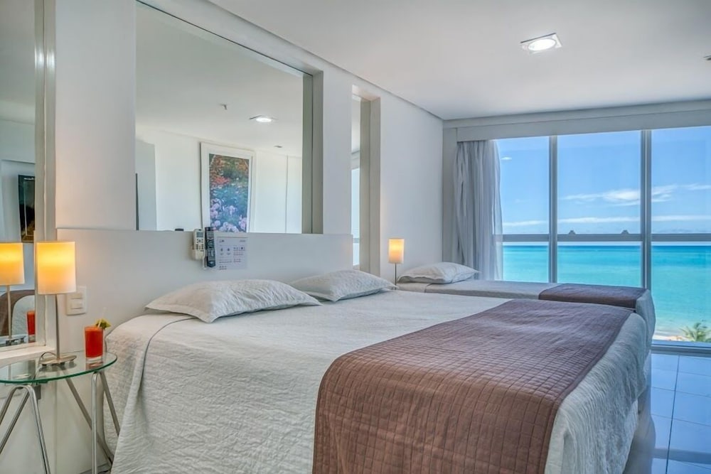 Premium Triplo Frente Mar