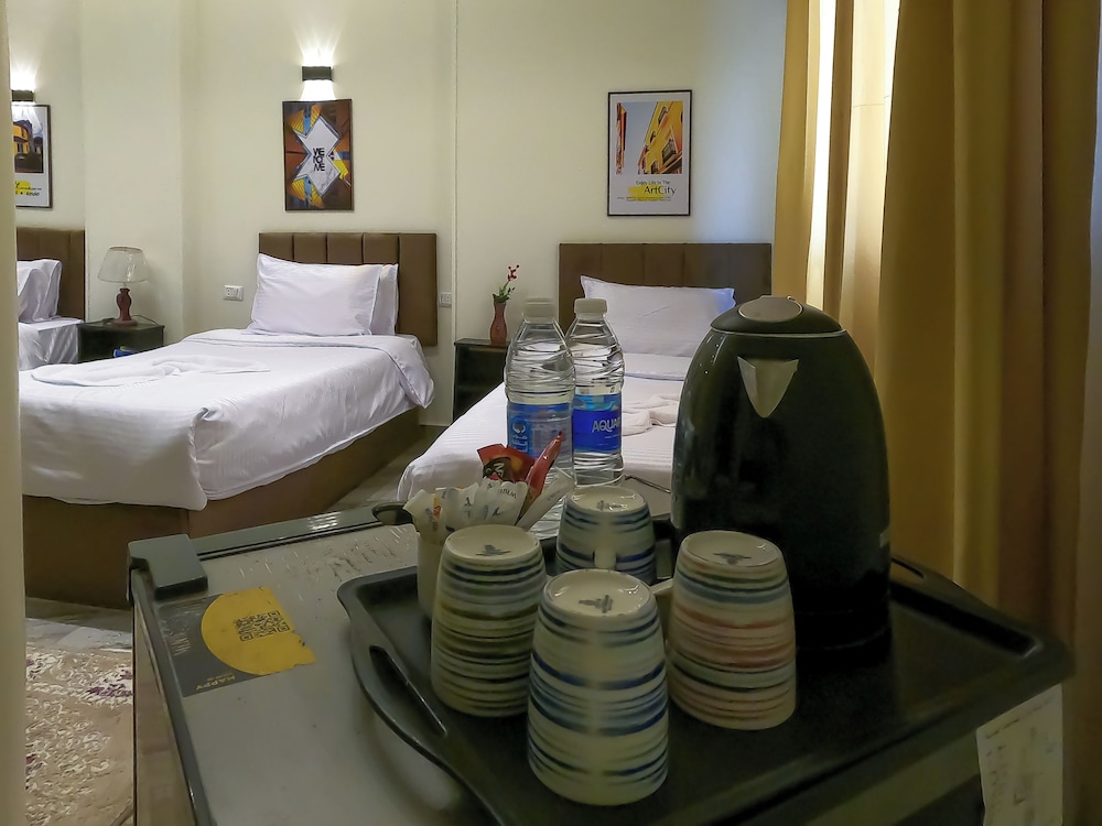 Economy Quadruple Room, Multiple Beds, City View photo 3
