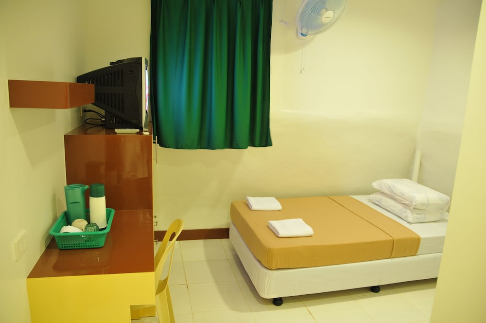 Fan Room with Single Bed, TV and Shared Bathroom photo 2
