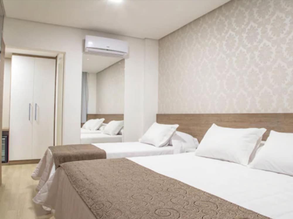 Deluxe Triple Room (APARTAMENTO TRIPLO CASAL)