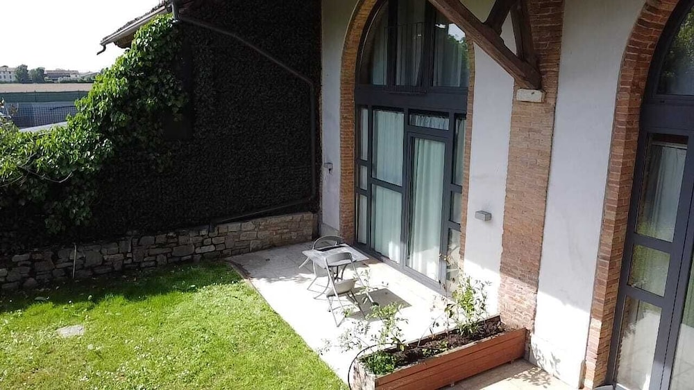 Camera Tripla con giardino