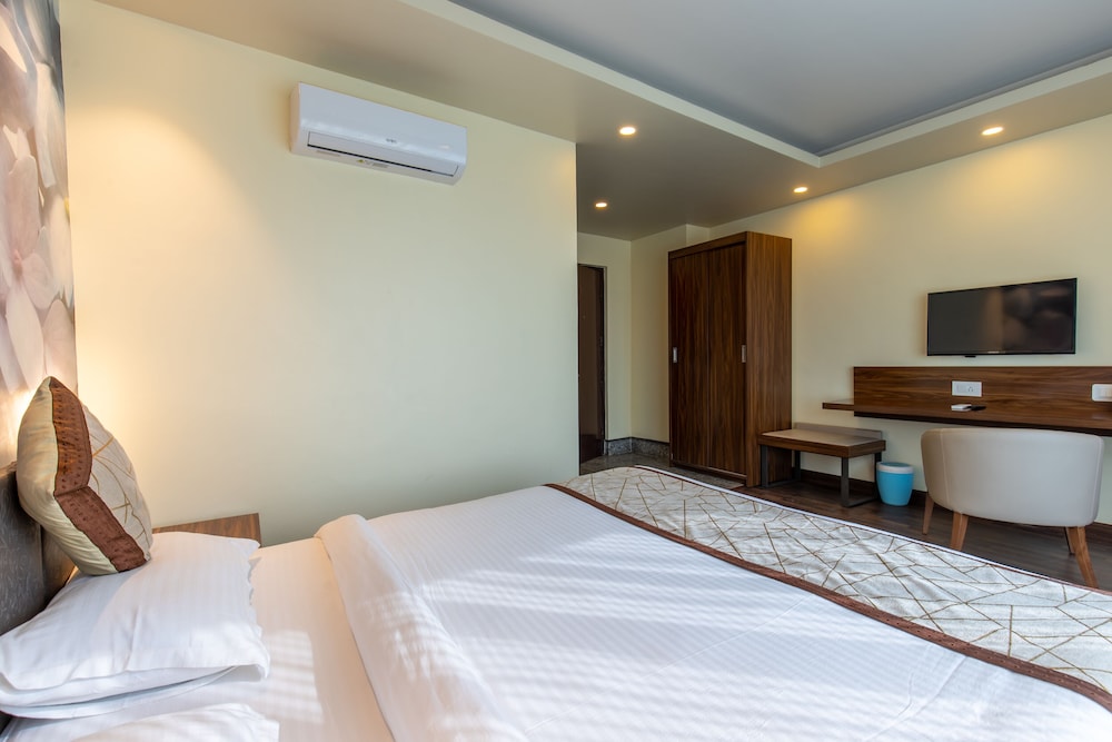 Deluxe Room - Photo 2
