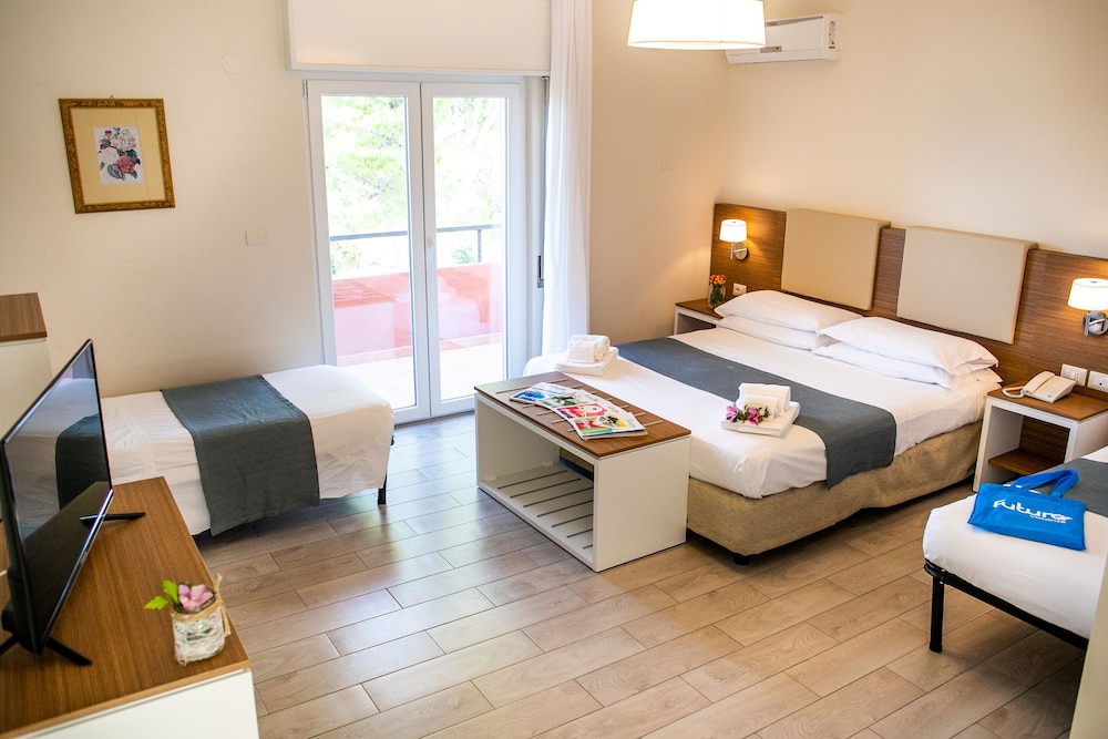 Superior Quadruple Room (2 Adults + 2 Children)