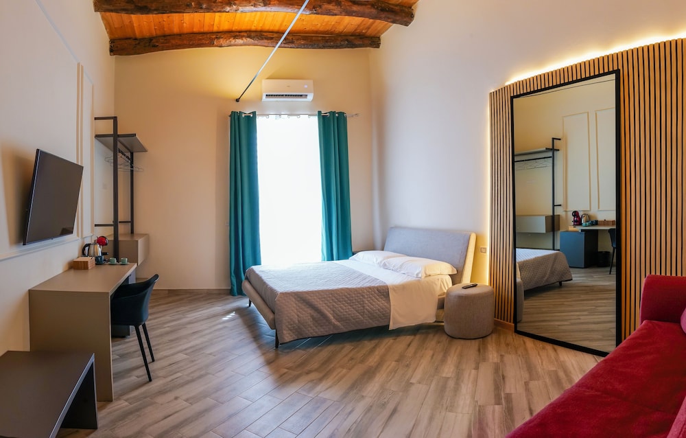 Deluxe Quadruple Room, Balcony, City View