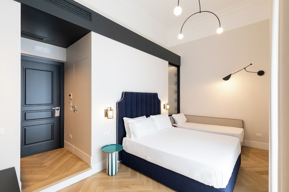 Deluxe Triple Room, Balcony, City View