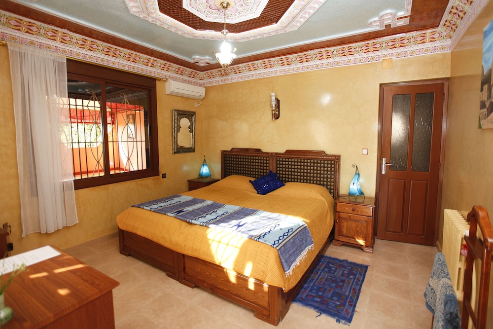 Basic Triple Room, Multiple Beds, Garden View photo 3