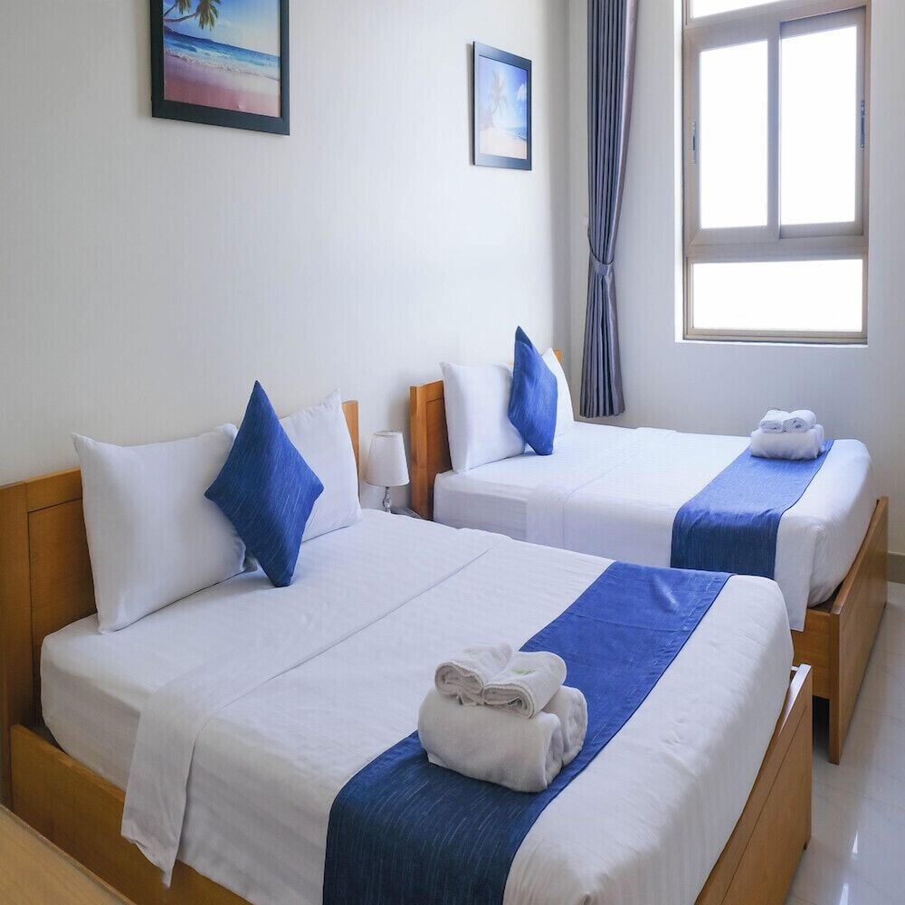 Deluxe Triple Room - Photo 2