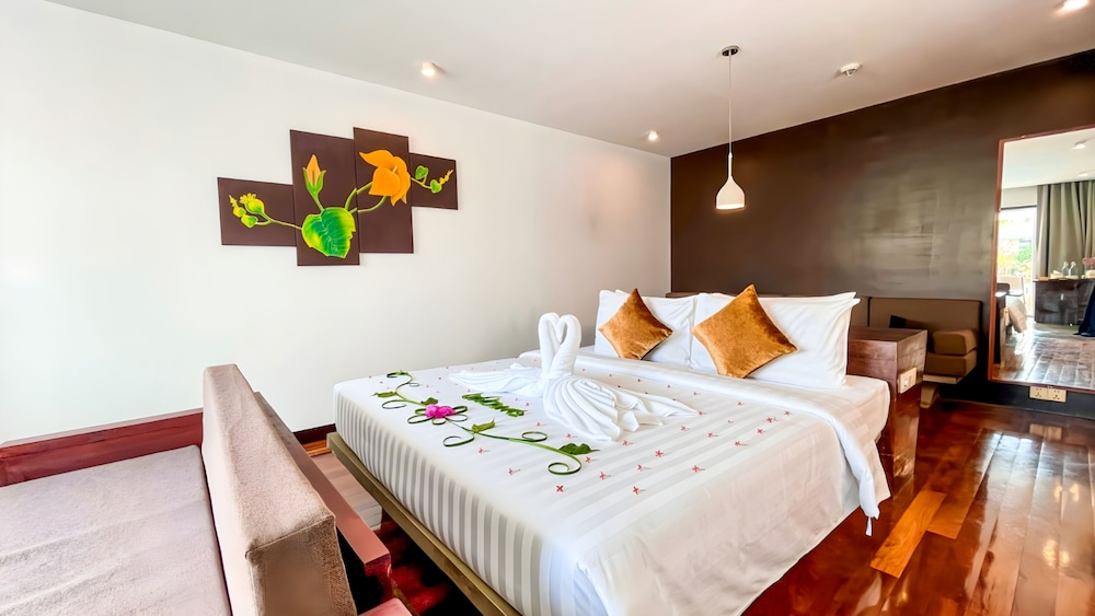 Junior King Suite Pool View with Balcony, Sofa, and Bathtub