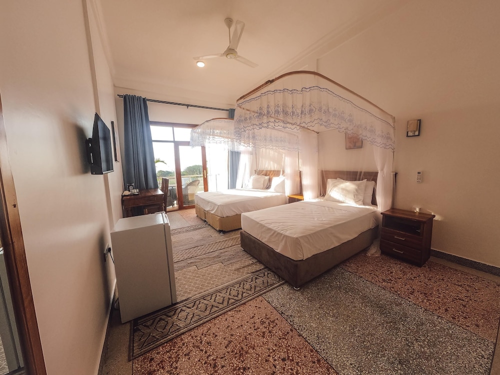 Deluxe Triple Room, Patio, Garden View