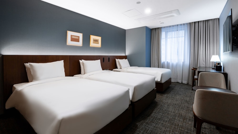 Family Triple Room - Photo 2
