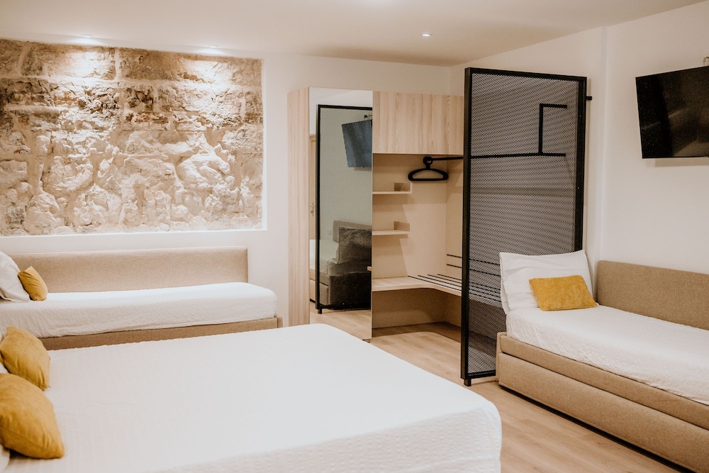 Comfort Quadruple Room, Courtyard View