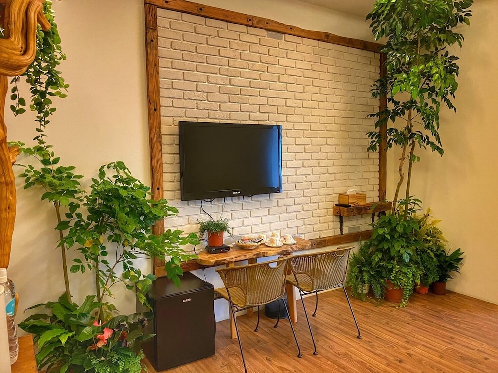 Family Quadruple Room, 1 Bedroom, Balcony, Garden Area photo 1