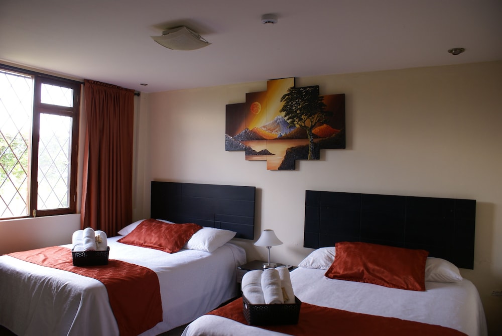 Deluxe Triple Room, 2 Queen Beds, Garden Area