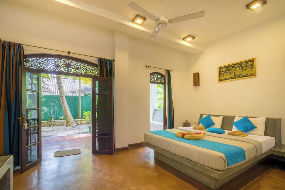 Deluxe Double Room, 1 King Bed, Private Bathroom, Garden View photo 1