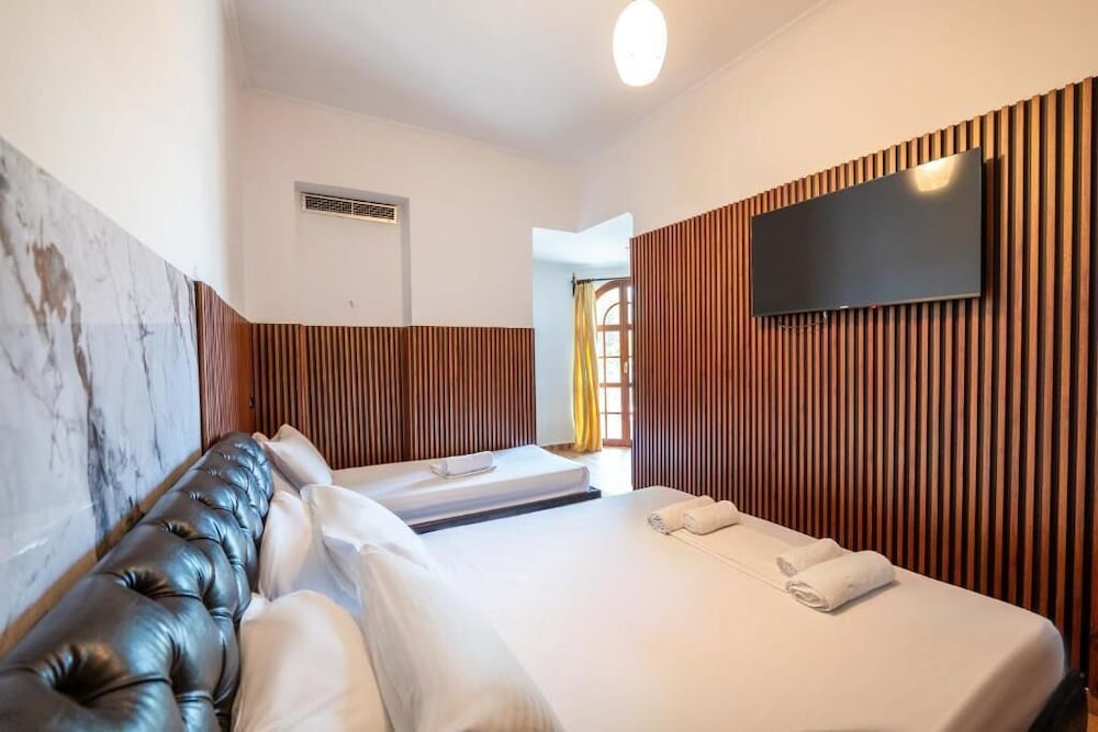 Standard Triple Room, Partial Sea View photo 1