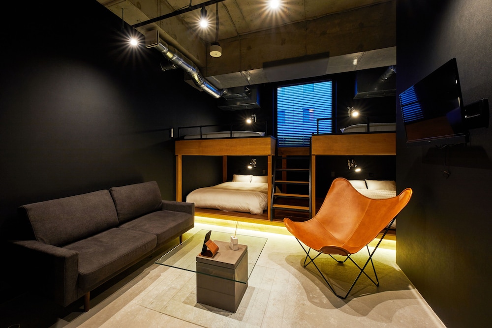 The Grand Room with 4 Double Beds and 1 Sofa - Non Smoking photo 1