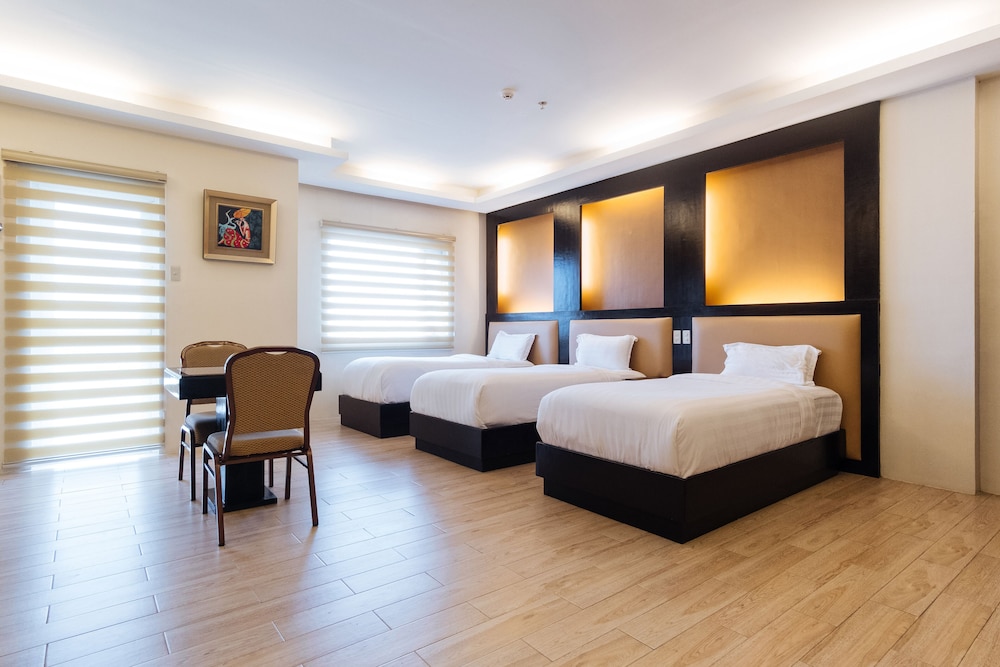 Deluxe Triple Room - Photo 1