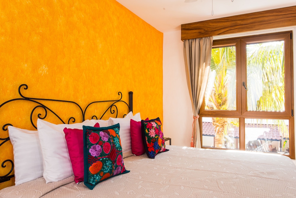Two Bedroom Master Suite with Balcony, Kitchenette and Pool View