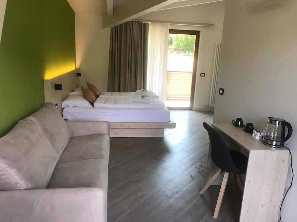 Deluxe Quadruple Room, Balcony photo 1