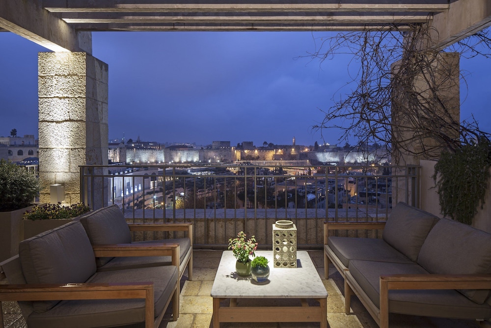 Premium Executive Suite with a terrace and Old City view.