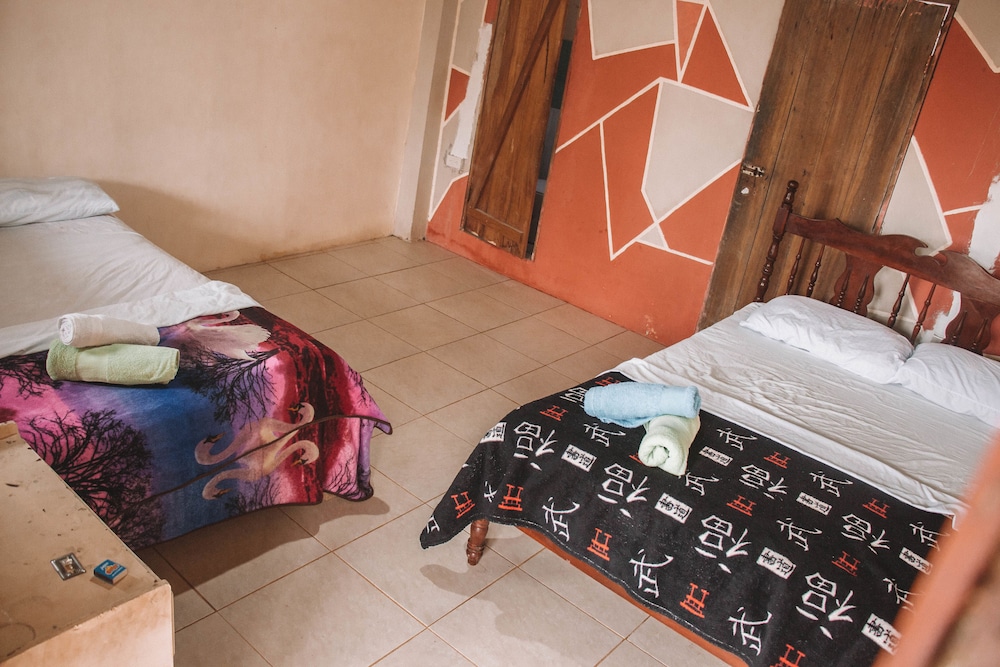 Economy Quadruple Room, 2 Double Beds, Private Bathroom, Beachfront photo 1