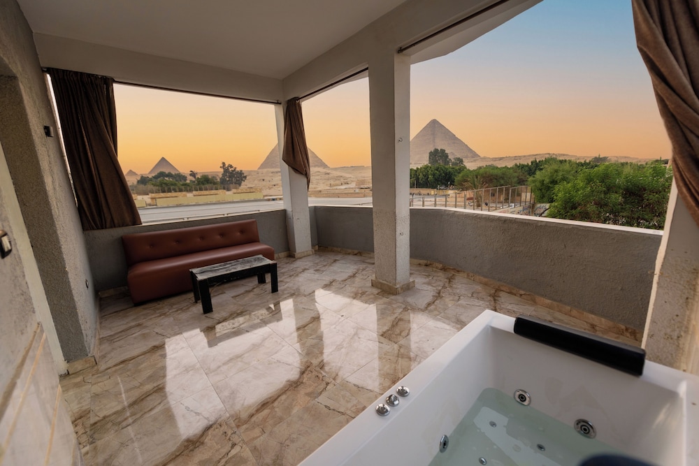 Luxury Hot Tub Room With Panoramic Pyramids View & Terrace photo 2