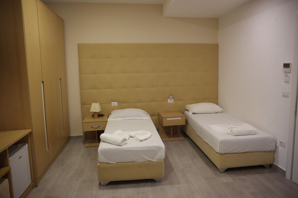 Standard Quadruple Room, 4 Bedrooms, Balcony photo 2