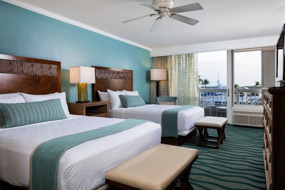 Two Bedroom Pool View Suite, King And Two Queen Beds