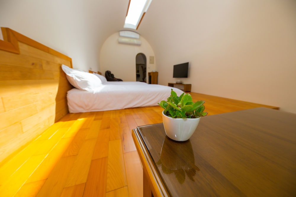 Signature Quadruple Room, 2 Double Beds, Courtyard View photo 2