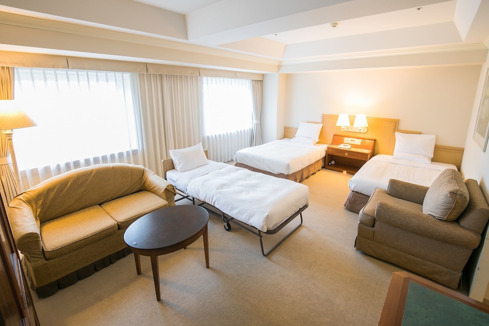 Deluxe Triple Room, Non Smoking (Eco Plan-No Cleaning Service) - Photo 1