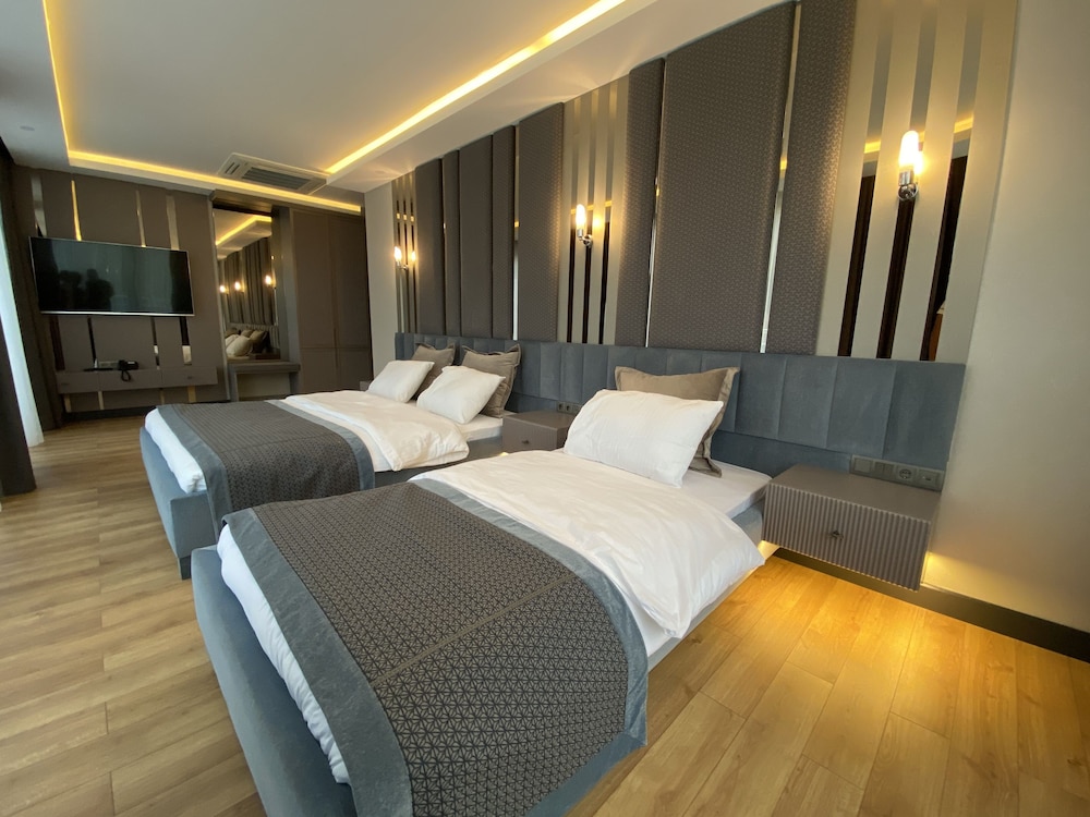 Deluxe Triple Room, 1 Bedroom, Balcony photo 1