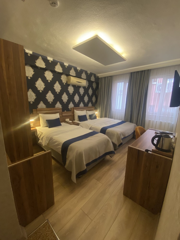 Standard Triple Room, Multiple Beds photo 1