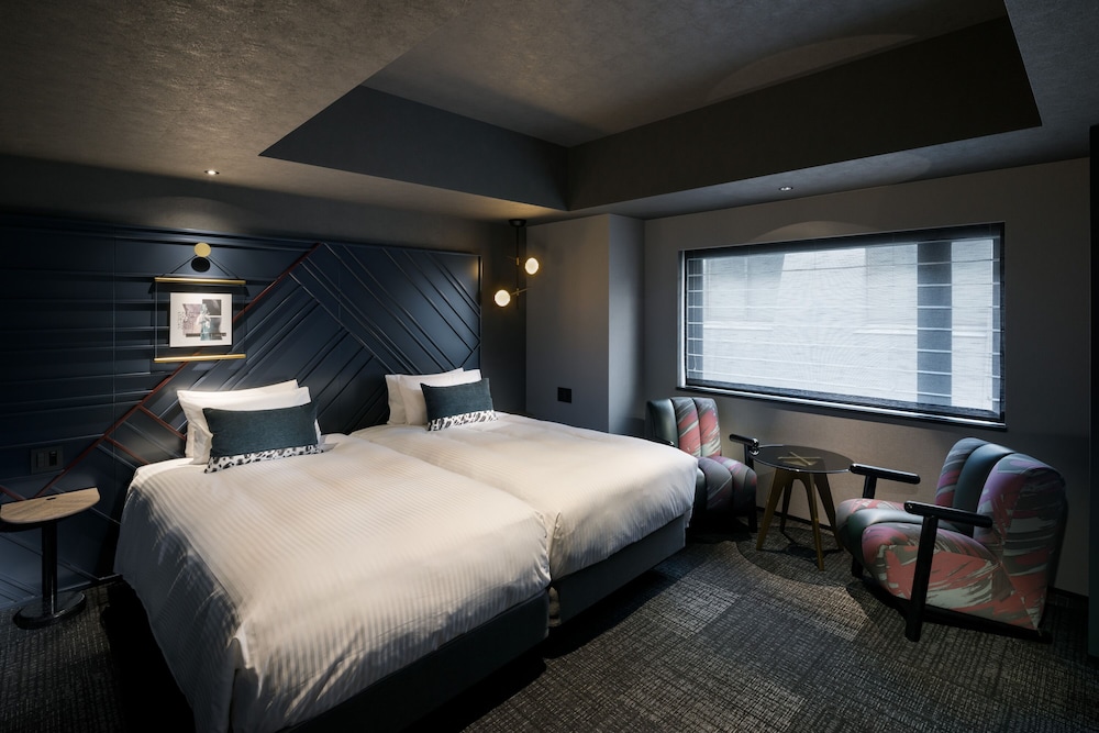 Deluxe Twin Room (with Washing Machine) - Photo 1