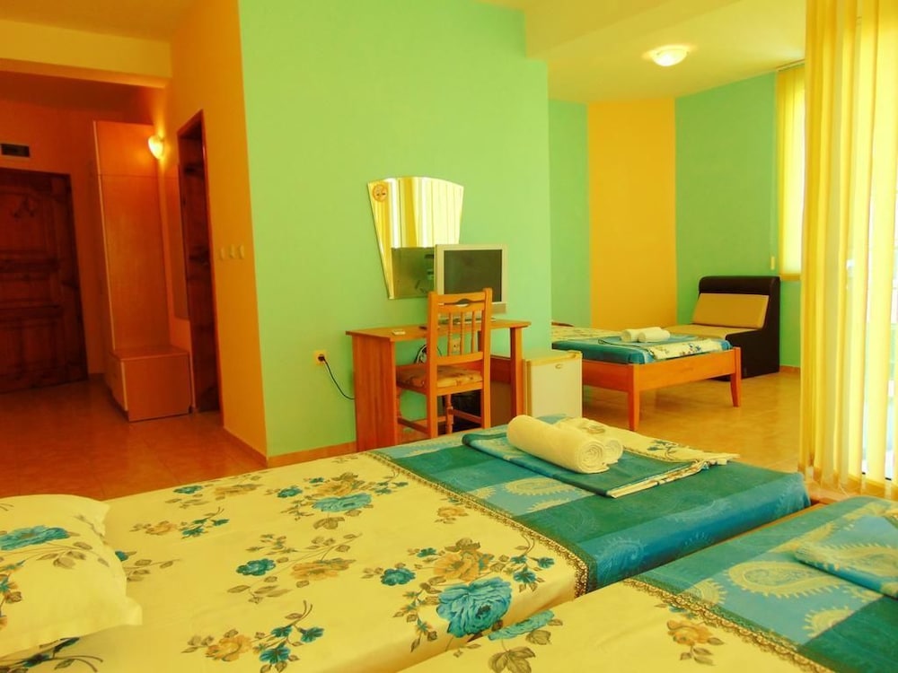 Deluxe Quadruple Room, Balcony, Partial Sea View