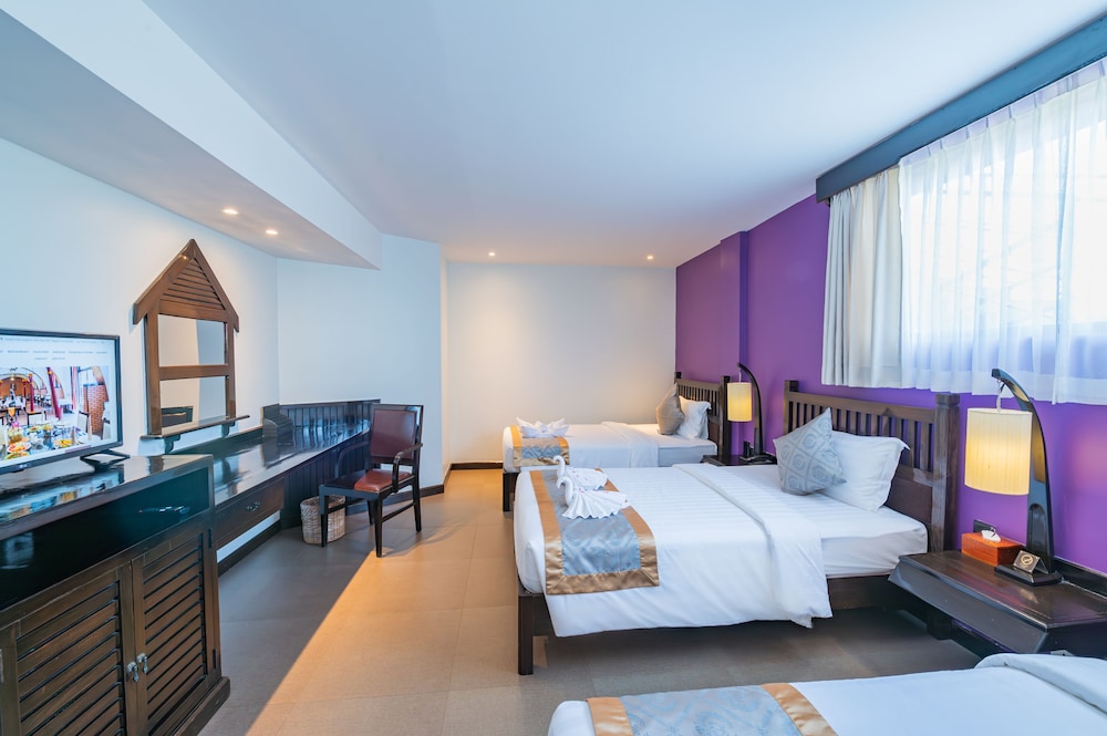 Deluxe Triple Room - Photo 1