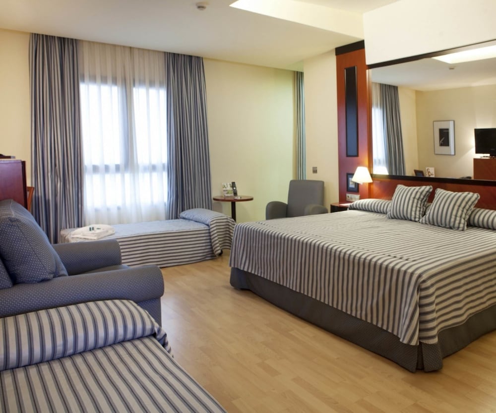 Habitación Triple (2 Adultos y 1 Niño)