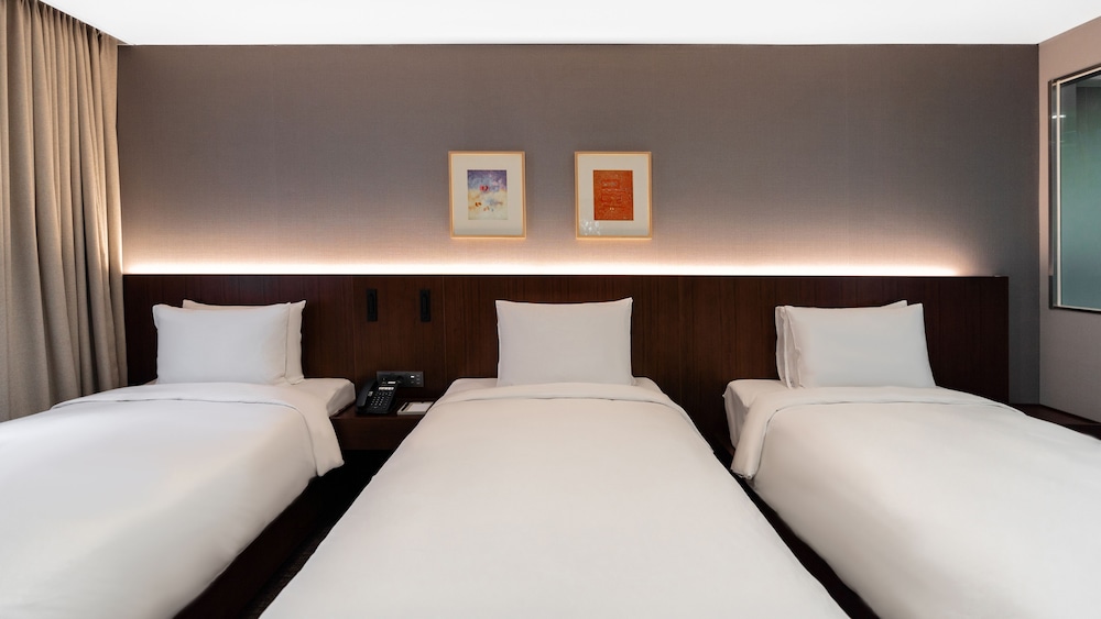 Family Triple Room - Photo 4