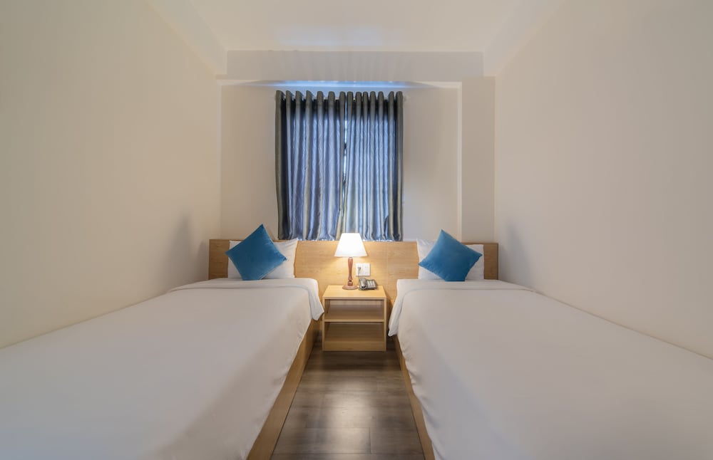 Basic Twin Room - Photo 7