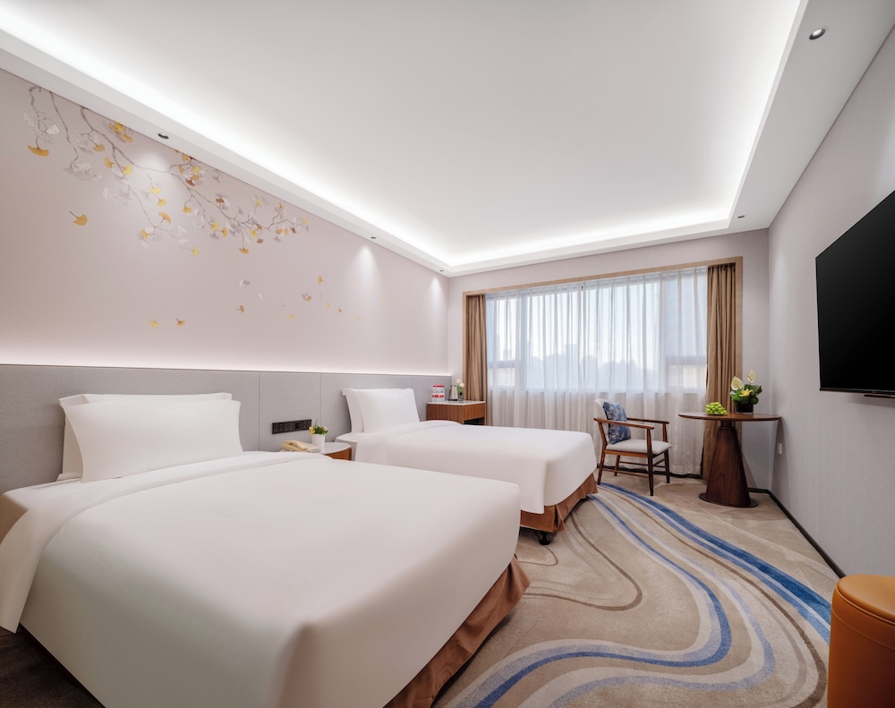 Elegant Twin Room - Photo 1