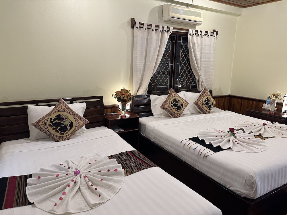 Deluxe Triple Room - Photo 20