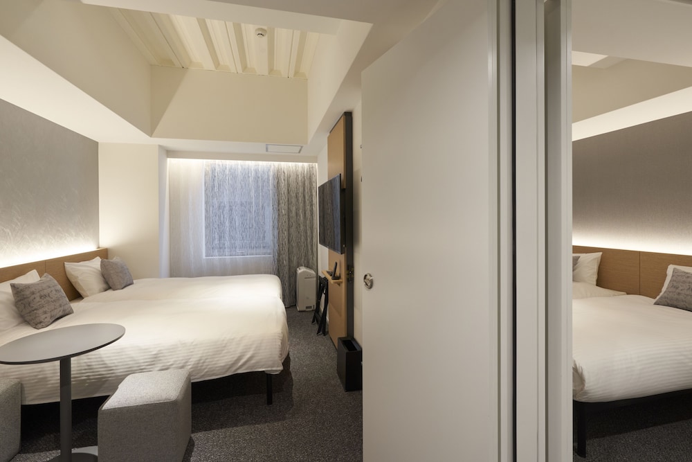 Connecting Room with 4 Single Beds - Photo 1
