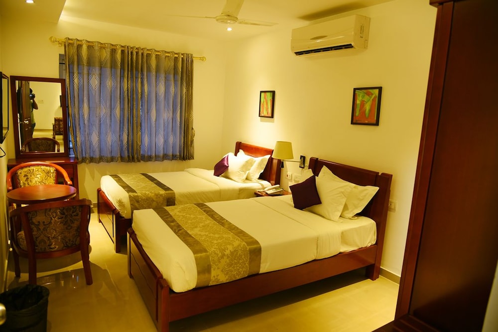 Twin Cot Room With Attached Bathroom