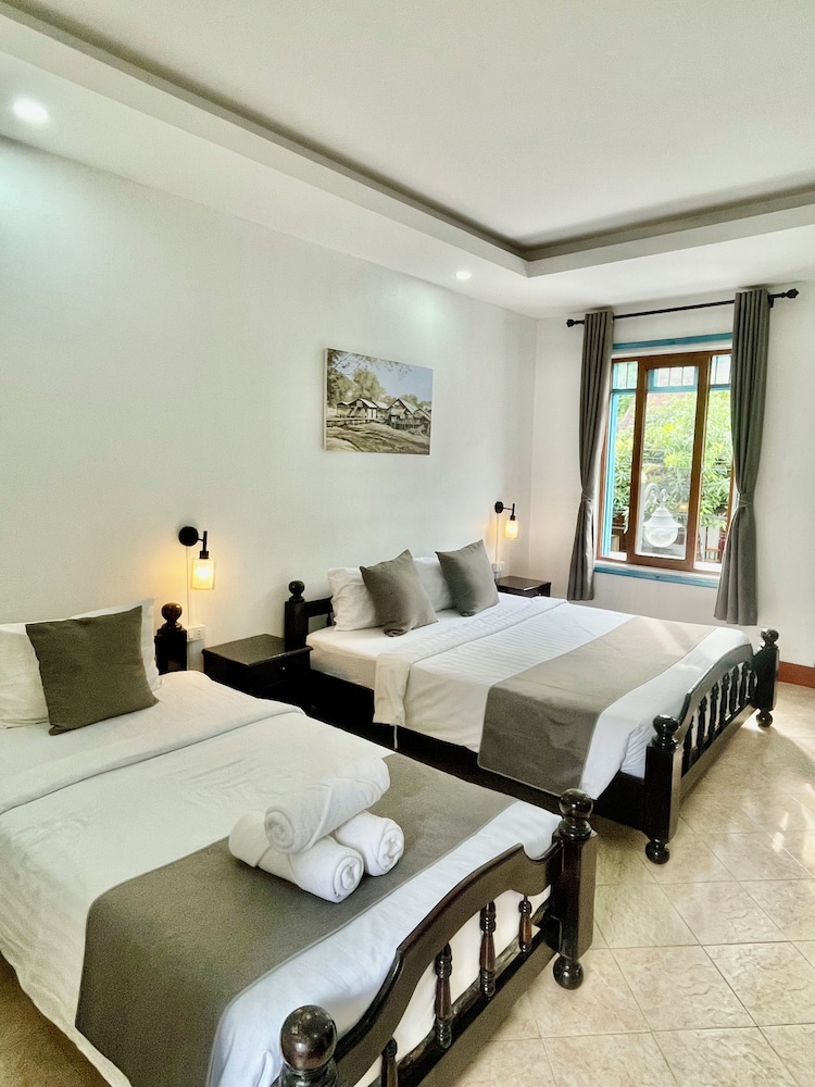 Family Triple Room, City View - Photo 1