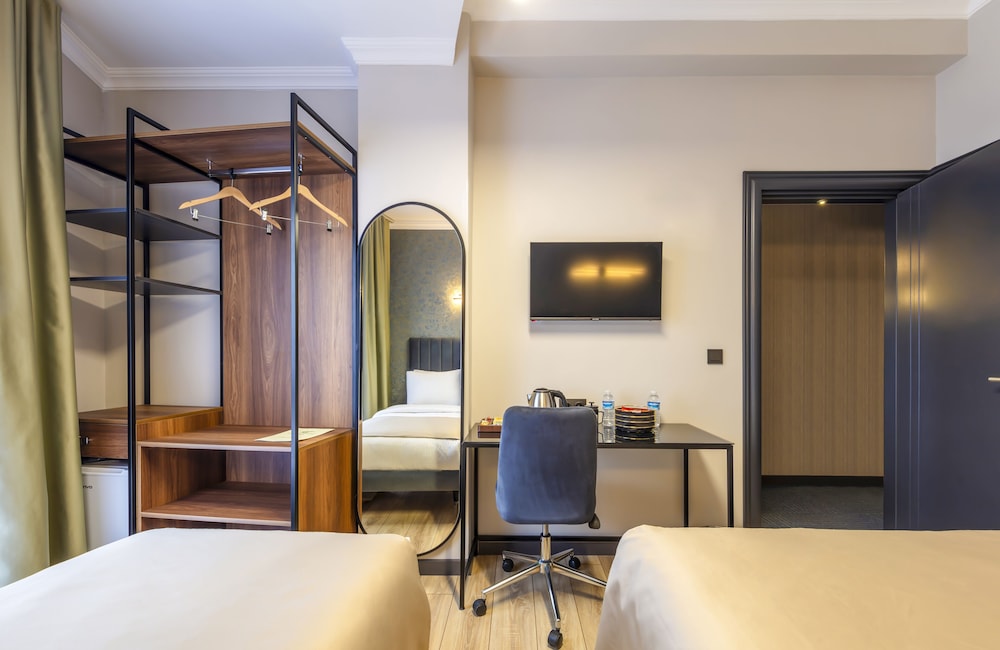 Deluxe Triple Room - Photo 5