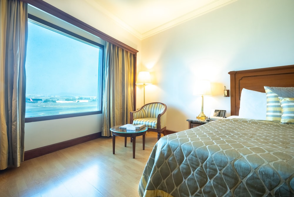 Club Room King Bed with Complimentary Airport Drop, Happy Hours at The Orchid Hotel Mumbai Vile Parle Club Room King Bed with Complimentary Airport Drop, Happy Hours at The Orchid Hotel Mumbai Vile Parle
