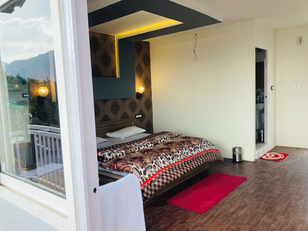 Deluxe Room - Photo 1