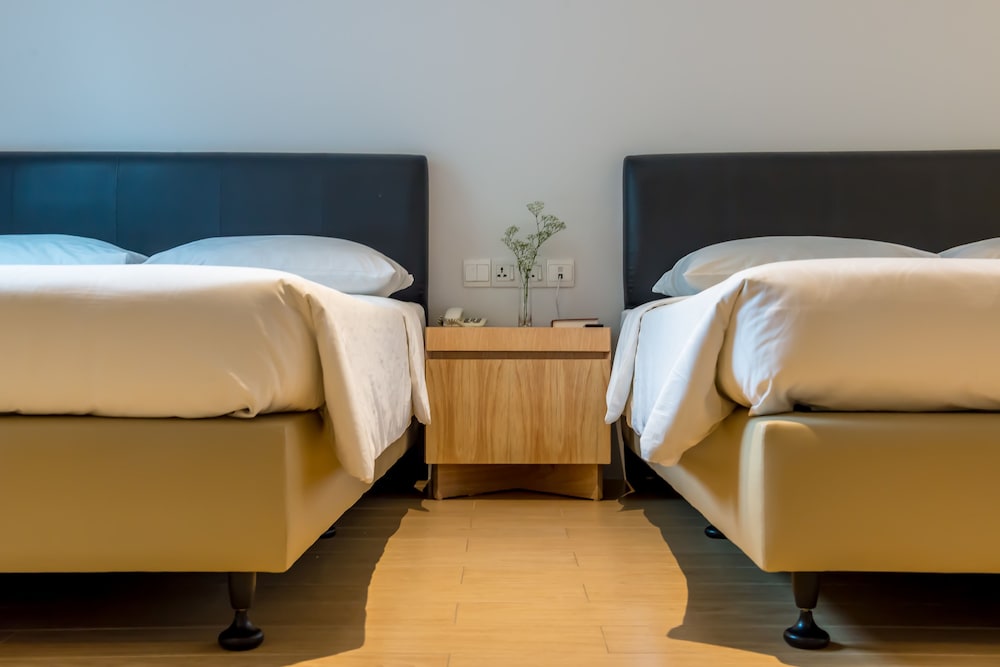 Deluxe Quadruple Room, 2 Queen Beds photo 2