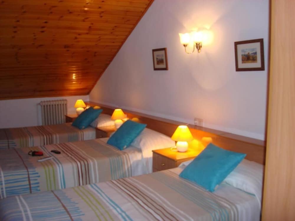 Habitación Triple (3 camas individuales)